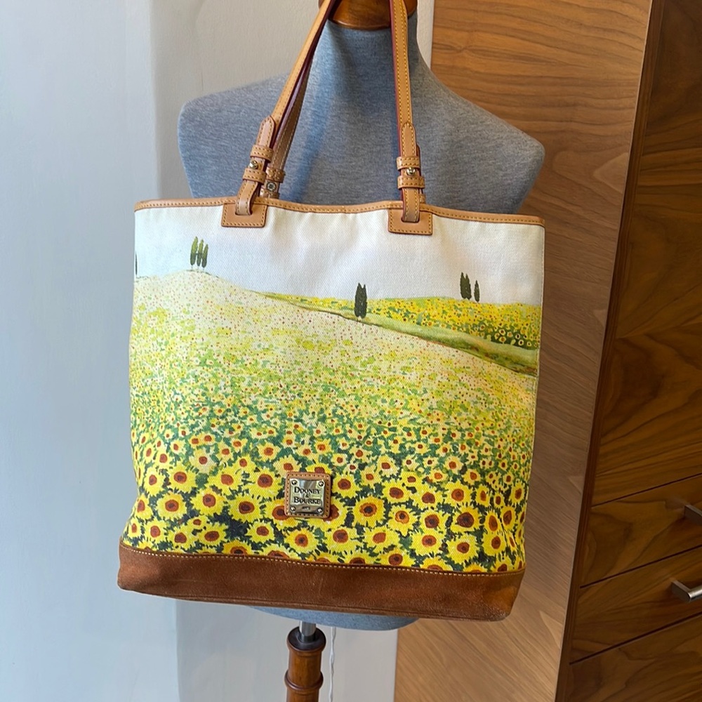 Dooney & Bourke canvas ,suede and leather sunflower tote. North/south lee tote